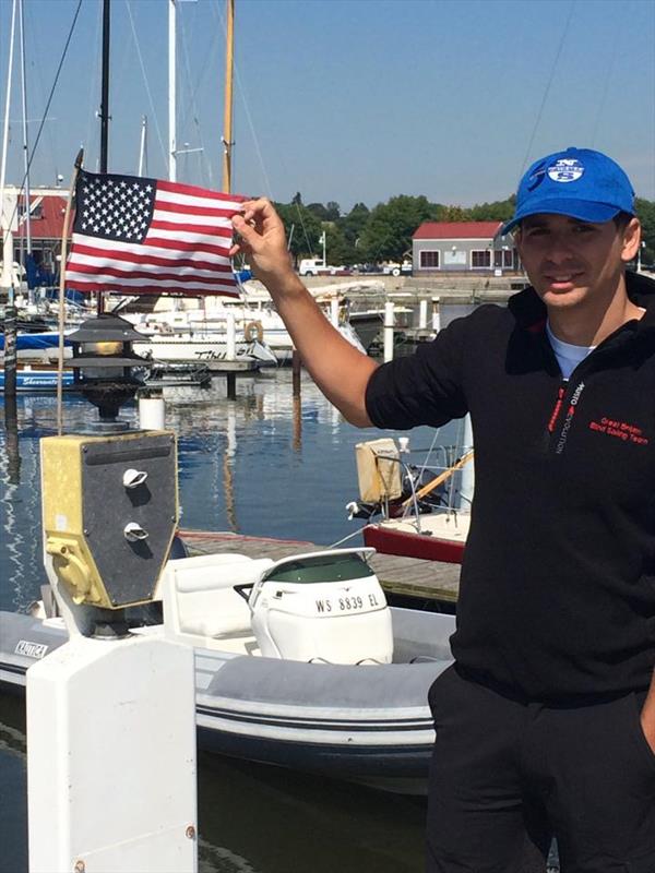 Liam and USA flag at the Blind Match Racing Worlds photo copyright Blind Sailing taken at Sheboygan Yacht Club and featuring the Match Racing class