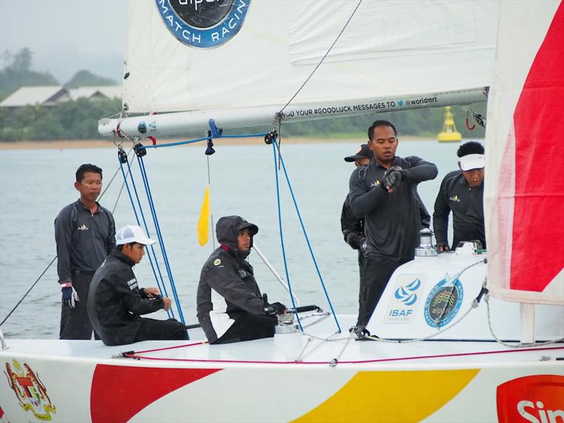 Hazwan Hazim Dermawan (2nd from left) in full focus while leading his team on day 1 of the Liga Layar Malaysia 2014 Pulau Duyong match racing photo copyright Norzuhaira Ruhanie taken at  and featuring the Match Racing class
