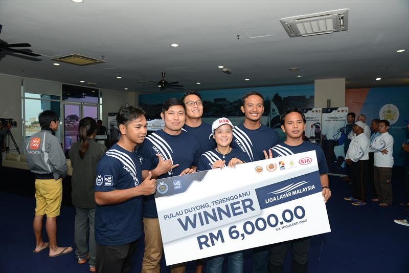 Nurul Elia Anuar and her crew members were all smiles after winning the grand prize of RM6,000 at the Liga Layar Malaysia 2014 Pulau Duyong match racing photo copyright Norzuhaira Ruhanie taken at  and featuring the Match Racing class