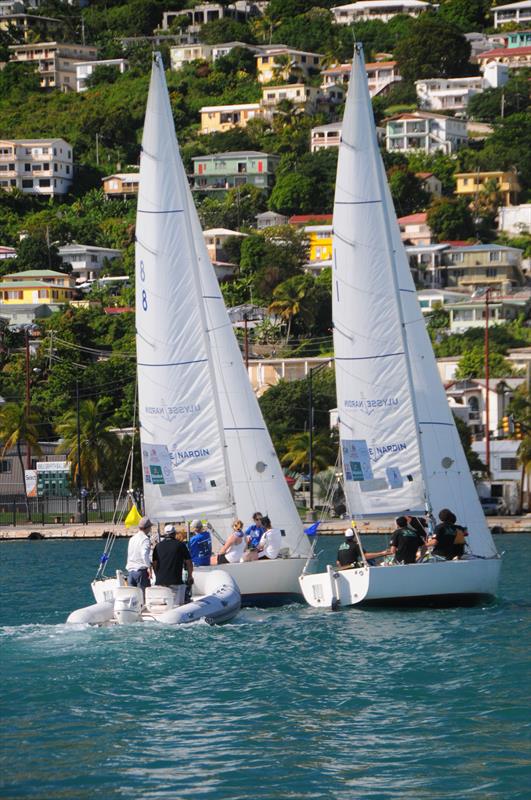 The USVI's Peter Holmberg, right (facing) and his team in close competition during the 2013 Carlos Aguilar Match Race photo copyright Dean Barnes taken at St. Thomas Yacht Club and featuring the Match Racing class