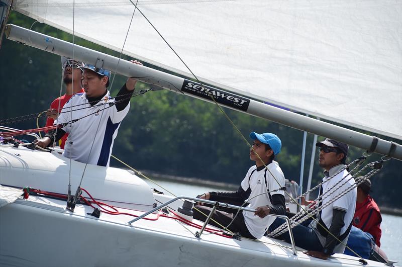 Sahril (right) aiming to get a win over league leader Hazwan on day 2 of Liga Layar Malaysia Port Klang photo copyright Norzuhaira Ruhanie taken at  and featuring the Match Racing class
