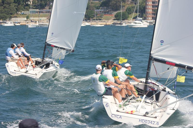 Hodgson taking on Boulden on day 3 of the Musto International Youth Match Racing Championship photo copyright Nick Fondas taken at Cruising Yacht Club of Australia and featuring the Match Racing class