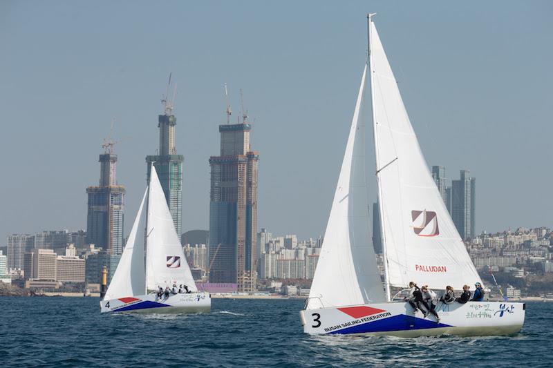 Danish Team Kattnakken (Trine Palludan) leads Korean Team Ladies (Eunjin Kim) on day 1 of the WIM Series Busan Cup photo copyright Kim Wolf / Busan Cup taken at  and featuring the Match Racing class