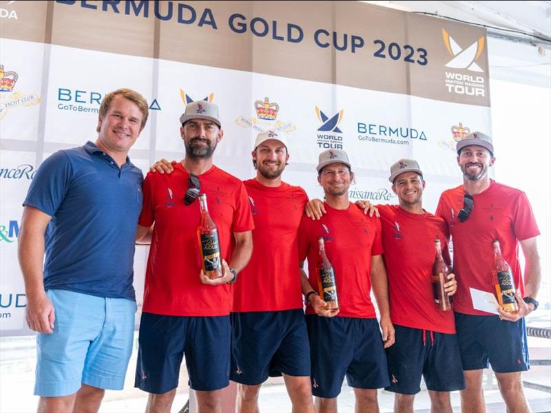 Bermuda Gold Cup 2023: Ambrose Gosling presenting second place to Stars Stripes USA (left to right Mike Buckley, Ian Liberty, Erik Shampain, Robby Bisi, Taylor Canfield/Skipper) photo copyright Ian Roman / WMRT taken at Royal Bermuda Yacht Club and featuring the Match Racing class
