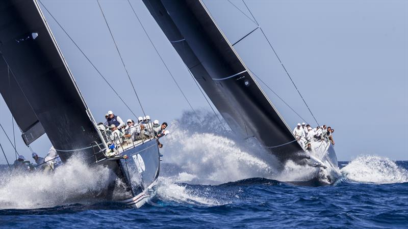 Bella Mente and Robertissima III duke it out at the Maxi Yacht Rolex Cup photo copyright Rolex / Carlo Borlenghi taken at Yacht Club Costa Smeralda and featuring the Maxi 72 Class class