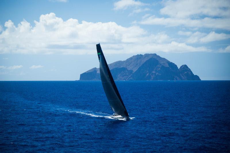Hap Fauth's Maxi72, Bella Mente passing Redonda in the RORC Caribbean 600 photo copyright RORC / ELWJ Photography taken at Antigua Yacht Club and featuring the Maxi 72 Class class
