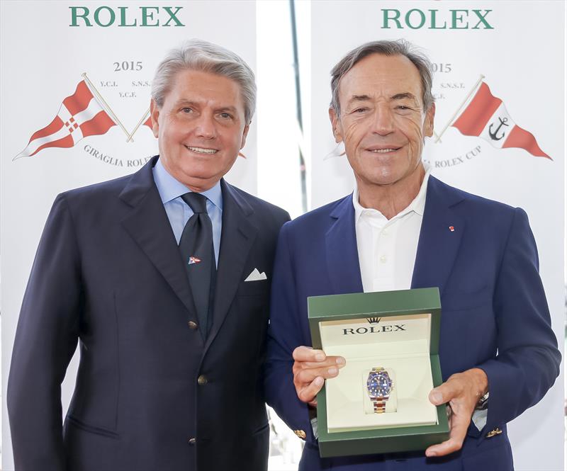 Gian Riccardo Marini, Rolex SA and Sir Lindsay Owen-Jones, owner of MAGIC CARPET CUBED photo copyright Rolex / Carlo Borlenghi taken at  and featuring the Maxi class