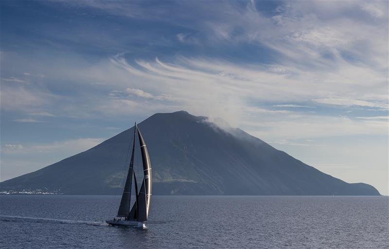 Rambler (USA) rounding Stromboli during the Rolex Middle Sea Race photo copyright Rolex / Carlo Borlenghi taken at Royal Malta Yacht Club and featuring the Maxi class