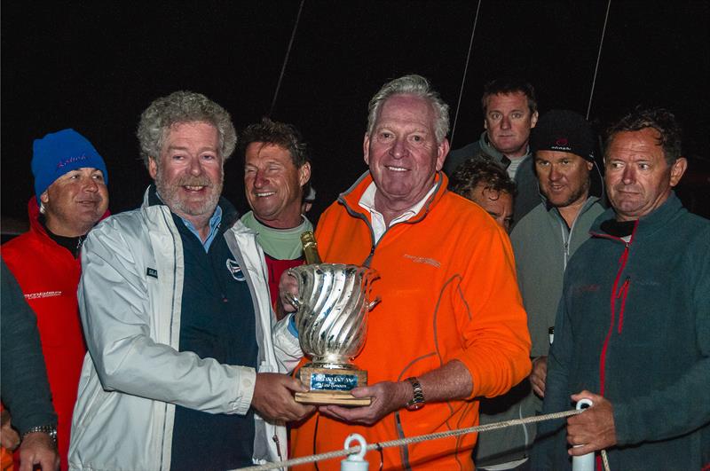 Rambler 88 owner George David receives the Volcano Race line honours trophy from IMA Secretary General Andrew McIrvine photo copyright Gianluca di Fazio / IMA taken at Yacht Club Gaeta and featuring the Maxi class