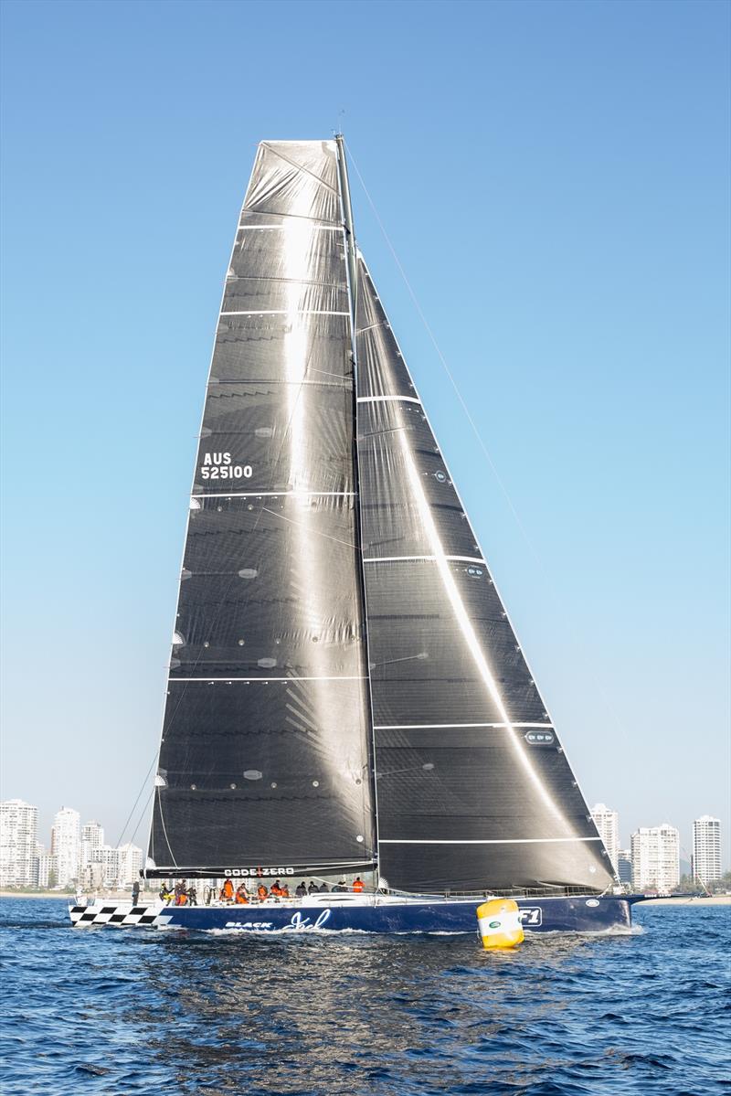 Black Jack crosses the finish line in the 2017 Land Rover Sydney Gold Coast Yacht Race photo copyright Ross Macdonald taken at Cruising Yacht Club of Australia and featuring the Maxi class