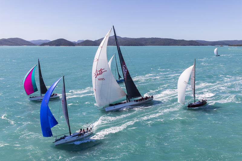 Wild Oats XI climbs through the fleet after the start in Dent Passage on day 1 of Audi Hamilton Island Race Week 2017 - photo © Andrea Francolini