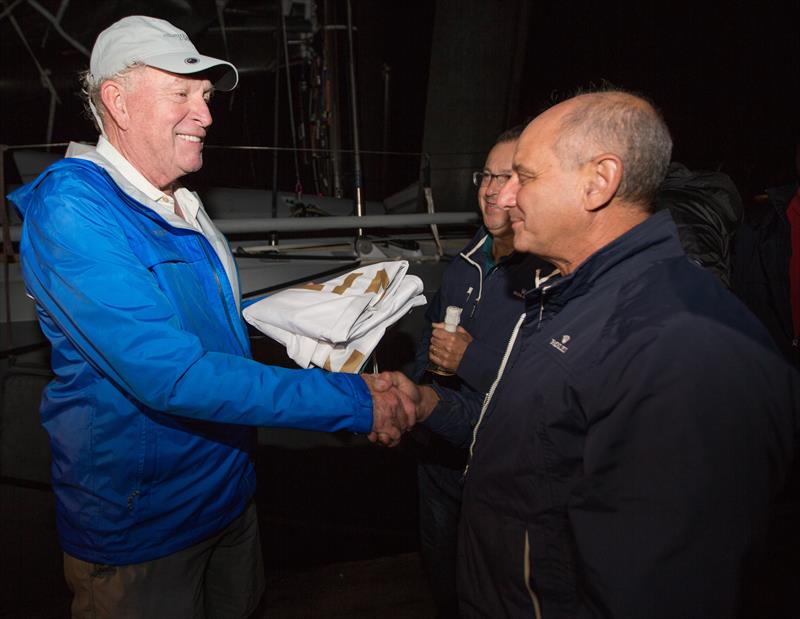 George David being presented with the 2017 Rolex Middle Sea Race Line Honours Flag by Royal Malta Yacht Club Commodore Godwin Zammit photo copyright Rolex / Kurt Arrigo taken at Royal Malta Yacht Club and featuring the Maxi class