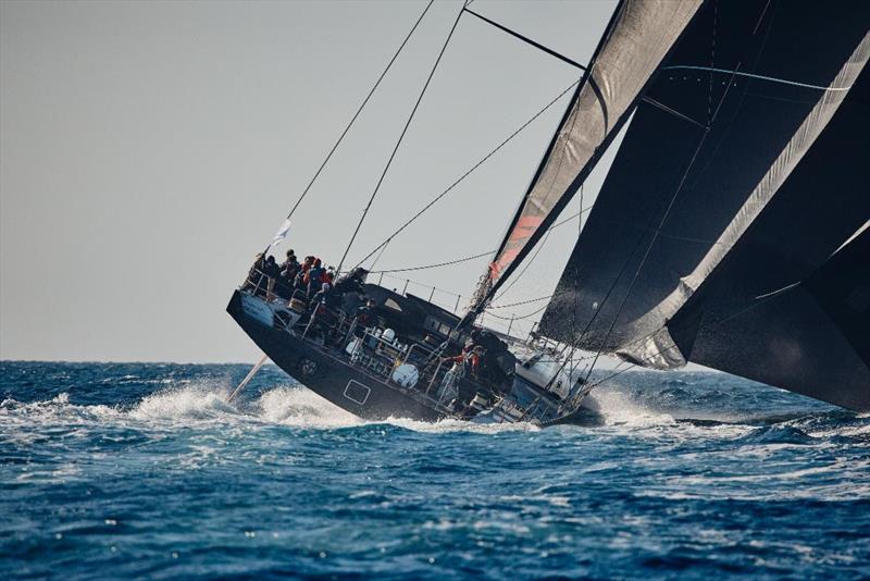 A spectacular sight at the start of the 8th RORC Transatlantic Race - the 100ft canting keel Maxi Comanche, skippered by Mitch Booth photo copyright James Mitchell taken at Royal Ocean Racing Club and featuring the Maxi class