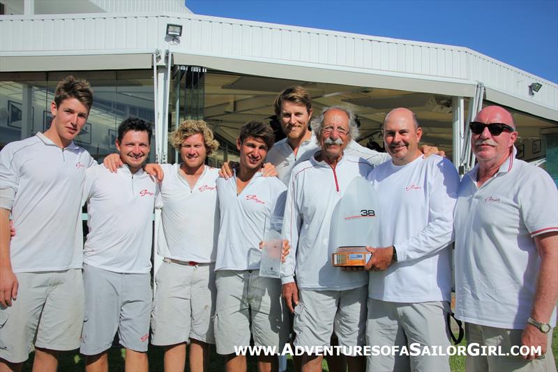 Champions Ginger with Leslie Green standing next to Richie Allanson (holding the trophy) at the MC38 Australian Championship photo copyright Nic Douglass / Adventures of a Sailor Girl taken at Royal Prince Alfred Yacht Club and featuring the MC38 class