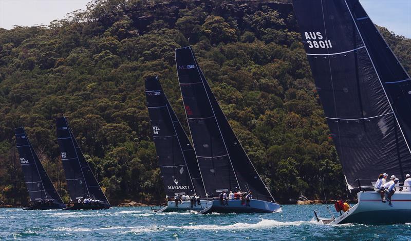 Fleet against the national park during MC38 2017-18 Summer Series Act 2 photo copyright Tilly Lock taken at Royal Prince Alfred Yacht Club and featuring the MC38 class