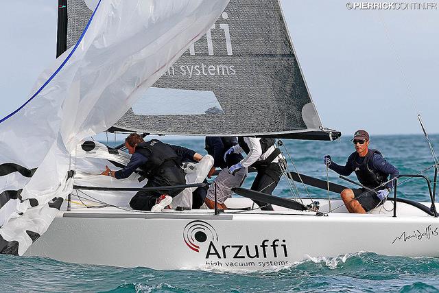 Gian Luca Perego's Maidollis 3 ITA822 with Carlo Fracassoli helming on Day 3 of the 2016 Melges 24 World Championship at Miami photo copyright Pierrick Contin / www.pierrickcontin.com taken at Coconut Grove Sailing Club and featuring the Melges 24 class
