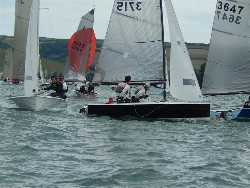 Action at mark number 7, Gerston on day 5 of Merlin Rocket week at Salcombe photo copyright Malcolm Mackley taken at Salcombe Yacht Club and featuring the Merlin Rocket class