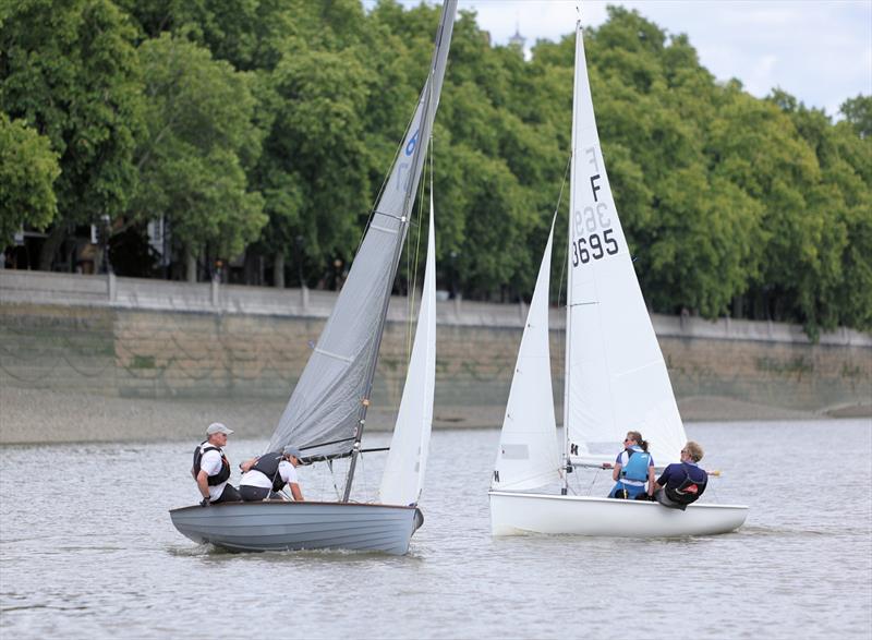 Tideway Dinghy Derby - The moment Merlin 607 overtakes Firefly 3695 on the return to Ranelagh - photo © Mark Jardine
