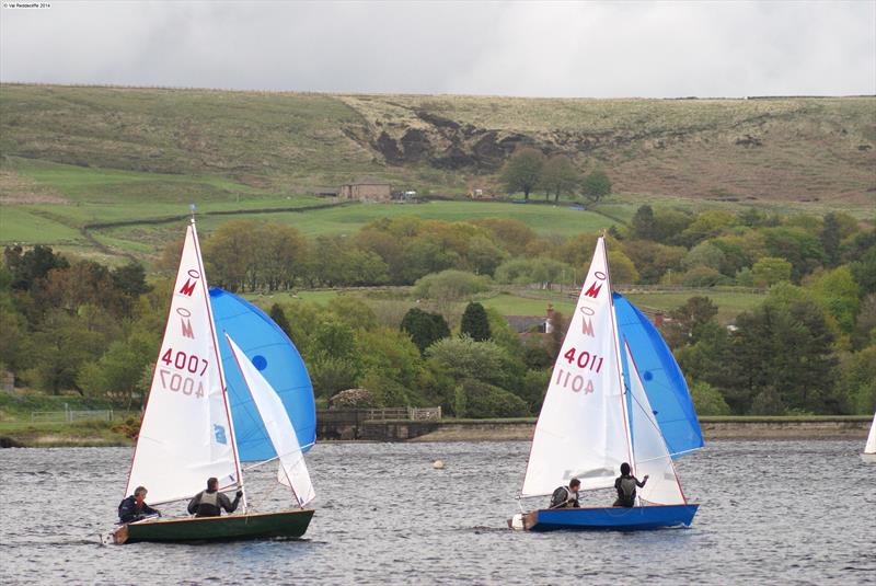 Ashley and Ross Southwell leading Simon Reddecliffe and Mark Atherton during the 2014 Miracle Northern Championships at Delph photo copyright Val Reddecliffe taken at Delph Sailing Club and featuring the Miracle class