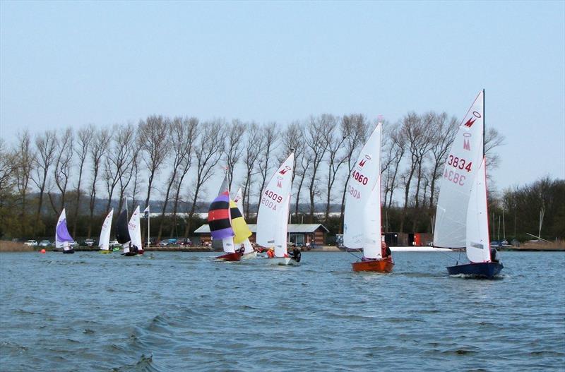 Jon Willars (3834) being chased by Dave Butler (4060) and Ben Williamson (4009) with the club in the background during the Welton Miracle Open photo copyright John Banks taken at Welton Sailing Club and featuring the Miracle class