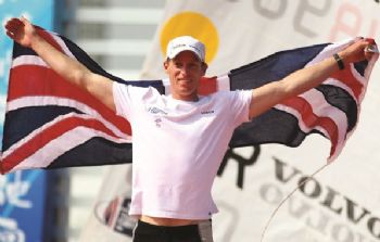 Bid for Olympic gold medallist, Paul Goodison’s framed sailing rash vest in a charity auction
