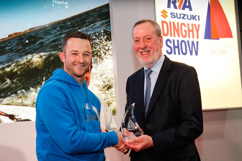 Mike Pope, executive chairman of GJW Direct, presenting Michael Sims his prize photo copyright Paul Wyeth / RYA taken at RYA Dinghy Show