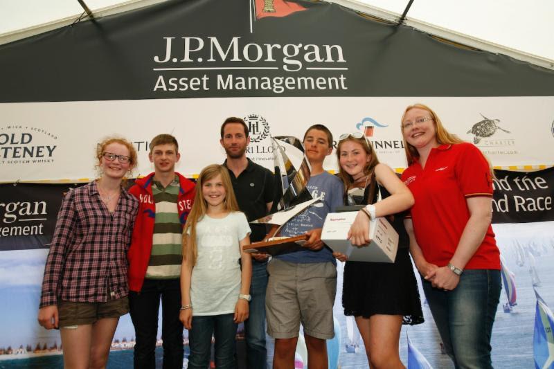The 2014 Raymarine RIR Young Sailor Trophy was awarded to Christopher Barker from Surrey, who was joined on stage by his siblings, Sir Ben Ainslie and Corrie McQueen from J.P. Morgan Asset Management photo copyright Patrick Eden taken at 