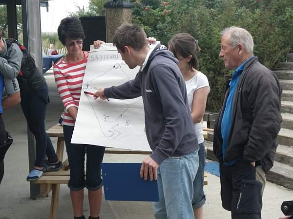 HISC volunteer mentor Tom Morris and team briefing participants at the latest HISC Get Racing Club event photo copyright Sarah Johnson taken at Hayling Island Sailing Club