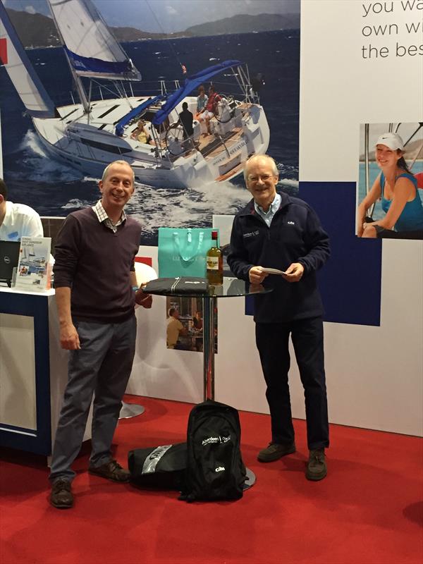 Roger Evans collected the first runners-up prize on behalf of Florence Agnes 2 from CWL Chairman, Peter Dickson, at the London Boat Show photo copyright CWL taken at 