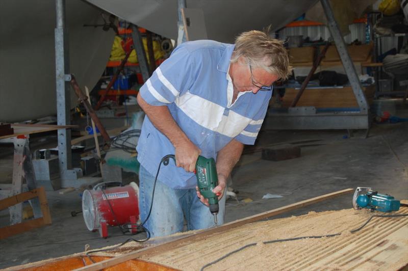 In a move designed to ensure the integrity of the new build, the author is seen here attaching a short length of wood saved from the donor hull, on to the re-born hull of Mercury II photo copyright Dougal Henshall taken at 
