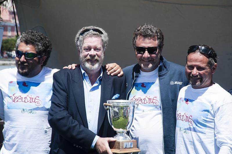 Shirlaf owner Giuseppe Puttini, with Paolo Cian (right), is presented with the trophy for overall handicap honours in the Volcano Race photo copyright IMA / Gianluca Di Fazio taken at Yacht Club Gaeta