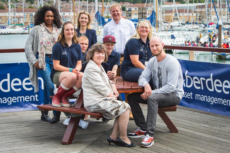 Toni Harriott (back left) and Jamie Lowe (front right) of St Giles Trust are joined by Kate Johnson (back middle) of Cowes Week Limited, Simon Davies (back right) of UKSA, Lynda Affleck (front left) of AAM and some UKSA young ambassadors - photo © AAM Cowes Week