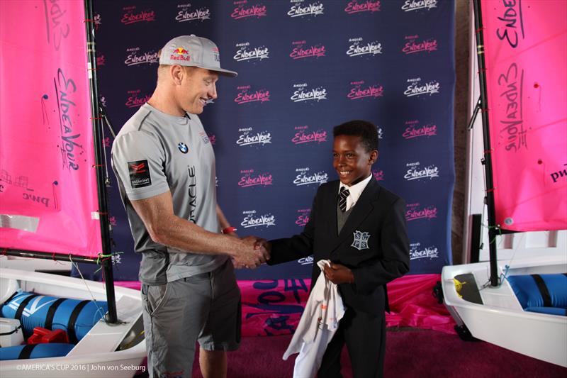 ORACLE TEAM USA skipper Jimmy Spithill with Keyan Webb, one of five AC Endeavour graduates to be gifted an Optimist dinghy - photo © John Von Seeburg / America's Cup