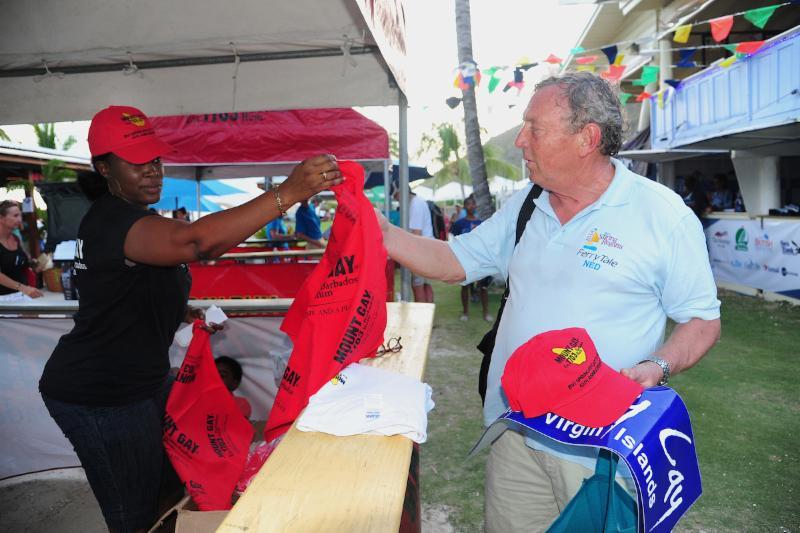 Skipper of the Dutch boat Ferry Tale collects the sought after Mount Gay Red Cap and goodie bag at the BVI Spring Regatta photo copyright BVI Spring Regatta & Sailing Festival / Todd VanSickle taken at Royal BVI Yacht Club