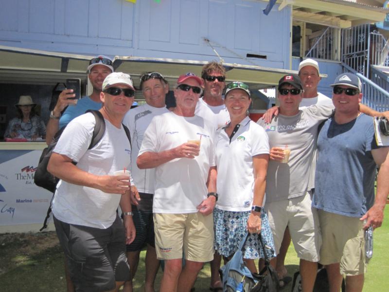 Doug Baker's team Magnitude - Conviction, the Californian TP52 crew enjoy a Painkiller cocktail after registering today at the BVI Spring Regatta - photo © BVI Spring Regatta & Sailing Festival/Todd VanSickle