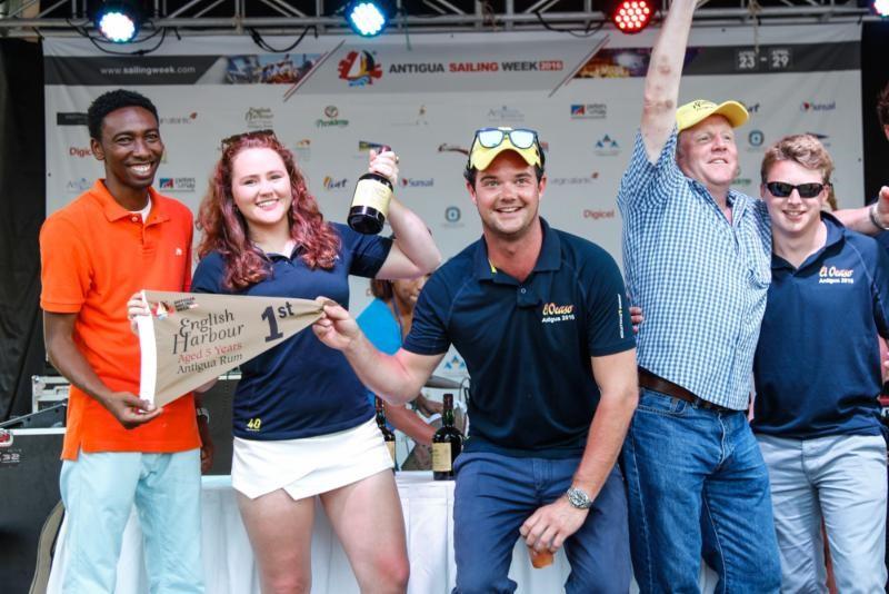 El Ocaso celebrate their win at the English Harbour Rum prizegiving on day 1 at Antigua Sailing Week - photo © ASW / Paul Wyeth / www.pwpictures.com