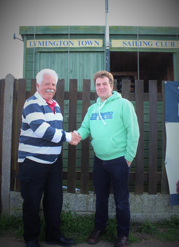 LTSC Commordore Rick Underhill greets Simon Morgan of Wildwind Holidays photo copyright Lou Johnson taken at Lymington Town Sailing Club