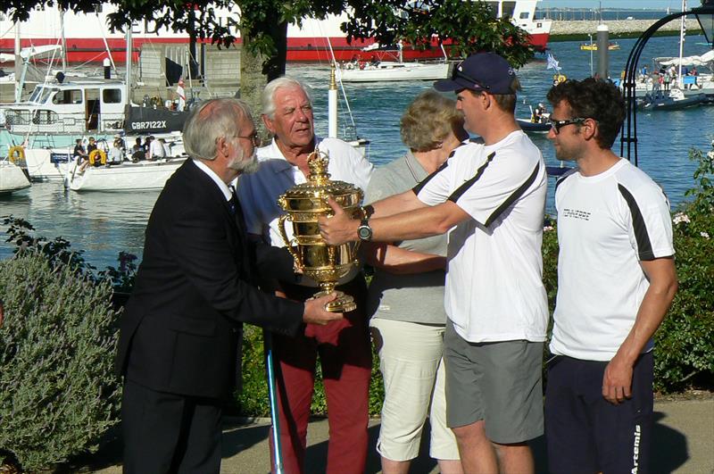 The Royal Southampton Yacht Club Commodore presents the Queen's Cup to the team on Tonnerre photo copyright Michael Ford taken at Royal Yacht Squadron