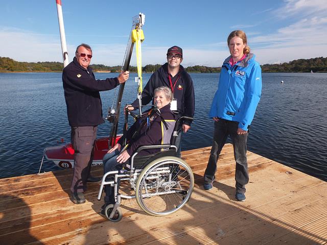 Barbara Wright, President of Farnham Lions, agreed to be the guinea pig during the new jetty at Frensham Pond Sailability photo copyright Tony Machen taken at Frensham Pond Sailability