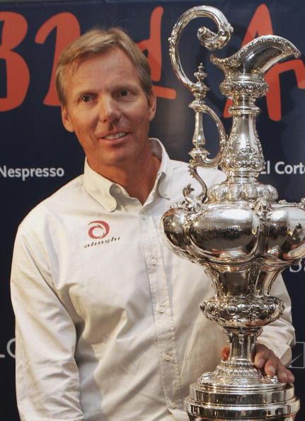 Jochen Schuemann, head of Team Alinghi, poses with the America's Cup trophy photo copyright Sean Gallup taken at 