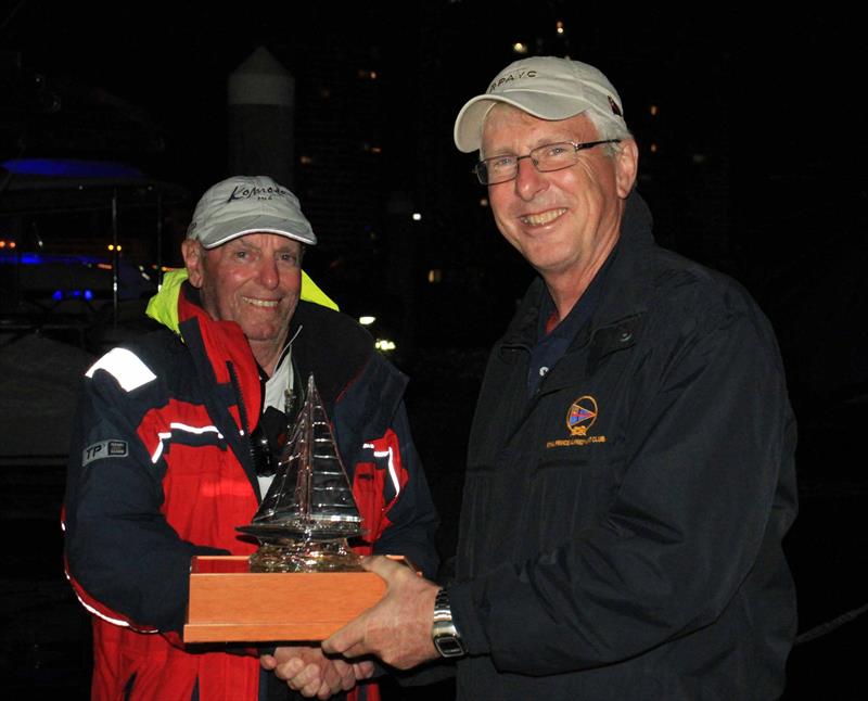 Doug Coulter receives the Club Pittwater to Southport Yacht Race trophy from Commodore Ian Audsley (right) photo copyright RPAYC Media taken at 