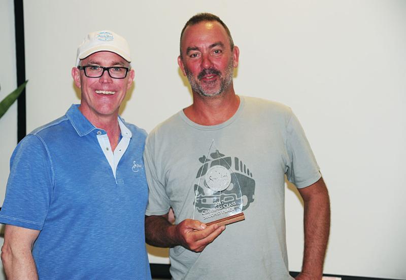 Norwood Smith, Vice President, Sales & Marketing, Scrub Island Resort, Spa & Marina presents Matt Barker's classic yacht, The Blue Peter with a beautiful trophy for 2nd in CSA cruising at the BVI Spring Regatta - photo © BVISR / ToddVanSickle
