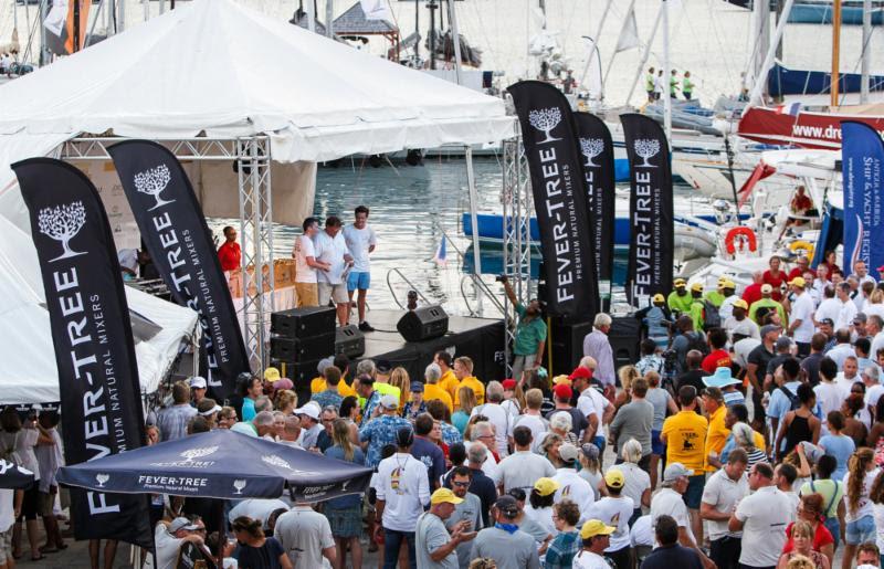 Competitors enjoy the Fever-Tree Race Day Prize Giving on the second day of racing at Antigua Sailing Week photo copyright Paul Wyeth / www.pwpictures.com taken at Antigua Yacht Club