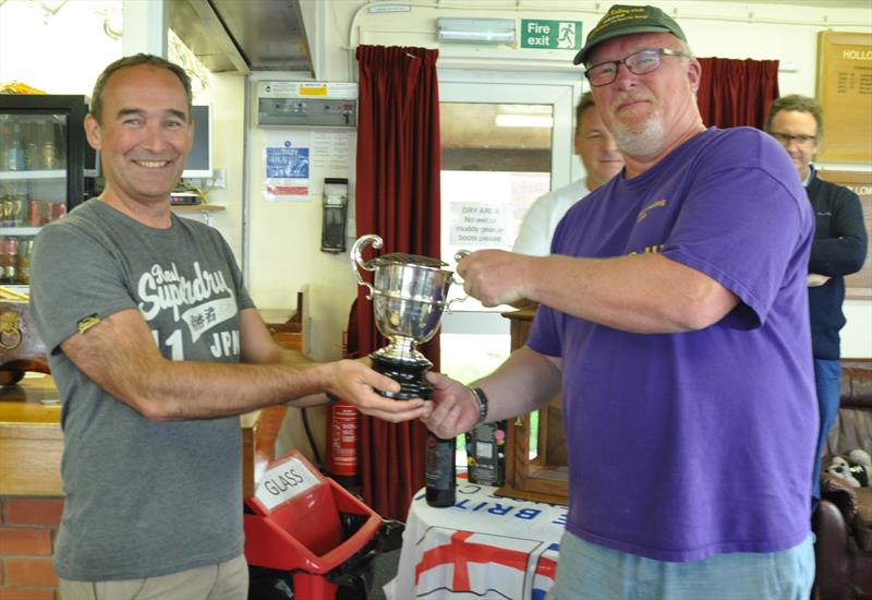 Mark Hope accepting the Inter-club Warwick Trophy at Hollowell photo copyright Stewart Elder taken at Hollowell Sailing Club
