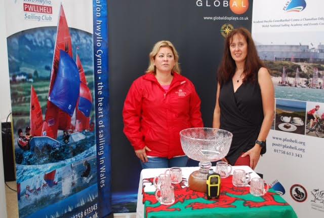 Jo Thompson `Aquaplane` winner of class 2 with Vicky Cox `Mojito` winner of class 1 and overall with the YB trackers and trophies sponsors by Global Displays photo copyright Gerallt Williams taken at Pwllheli Sailing Club