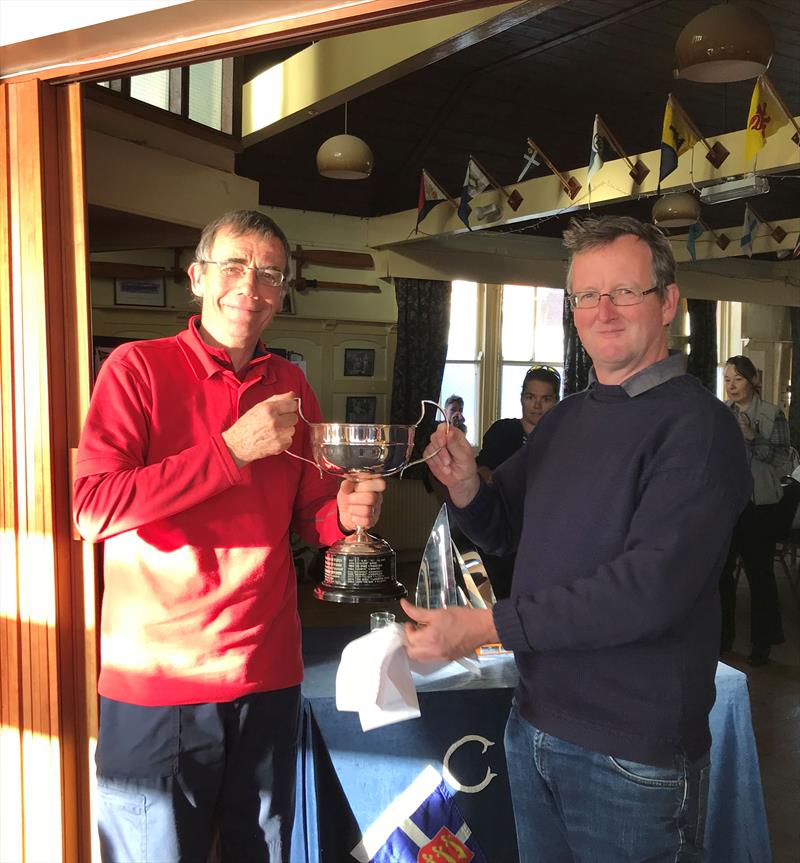 Steve Bratt from Grace and Danger collecting the Crouch YC Autumn Series Trophy from Phillip Harbott photo copyright Sarah Jane Vethaak taken at Crouch Yacht Club