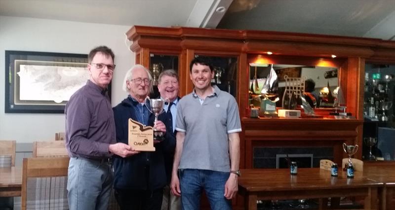 Jeff Condell & Jeff Cochrane of Fuggles accepting the Squib Trophy from Commodore Dave Sullivan and Bruce Matthews photo copyright Michele Kennelly taken at Kinsale Yacht Club