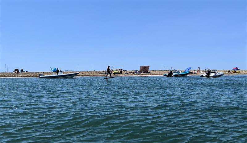 A plethora of boats enjoy the fine weather on Hurst Spit photo copyright Mark Jardine taken at Keyhaven Yacht Club