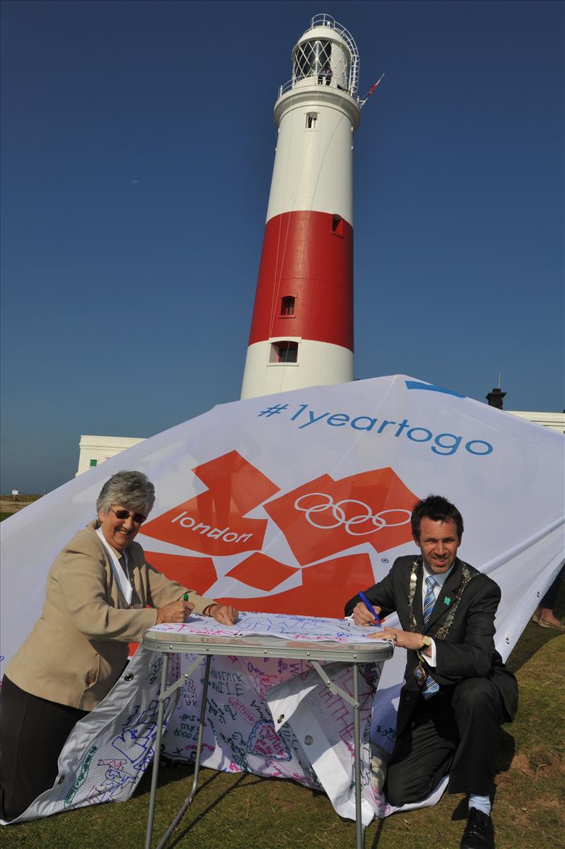 The Mayor of Portland and the Deputy Mayor of Weymouth and Portland sign the banner photo copyright JCPR taken at Weymouth & Portland Sailing Academy