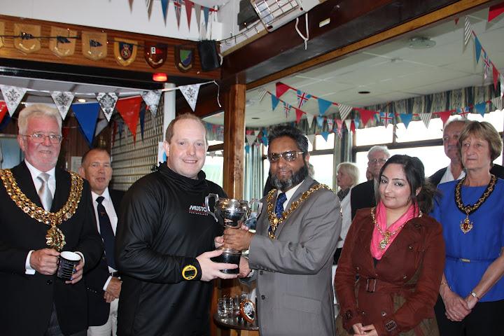Stuart Catterall receives the RNLI Trophy from the Mayor of Blackburn photo copyright D Shevelan taken at Bolton Sailing Club